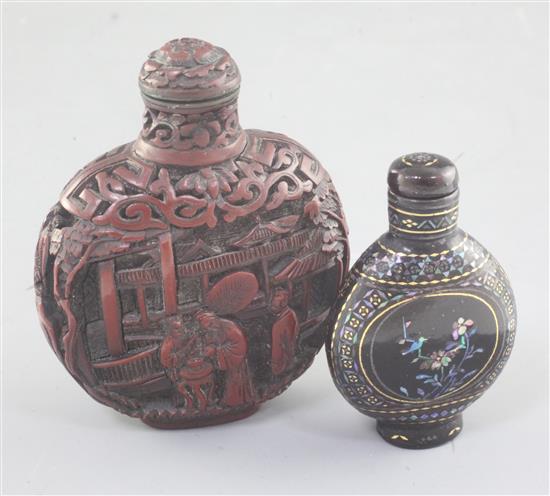 A Chinese cinnabar lacquer snuff bottle and a lac burgaute snuff bottle, 8.5cm and 6.5cm